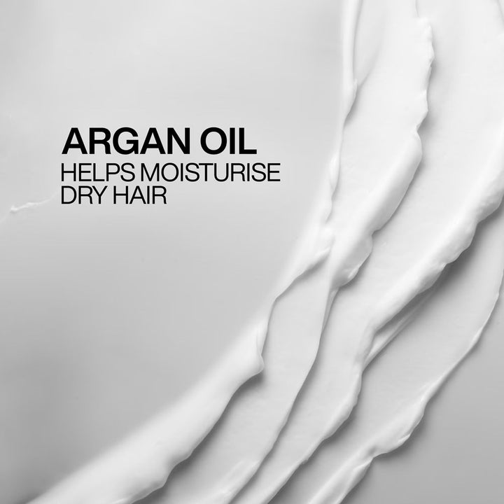 Creamy swatch of Redken All Soft Conditioner with argan oil for dry hair